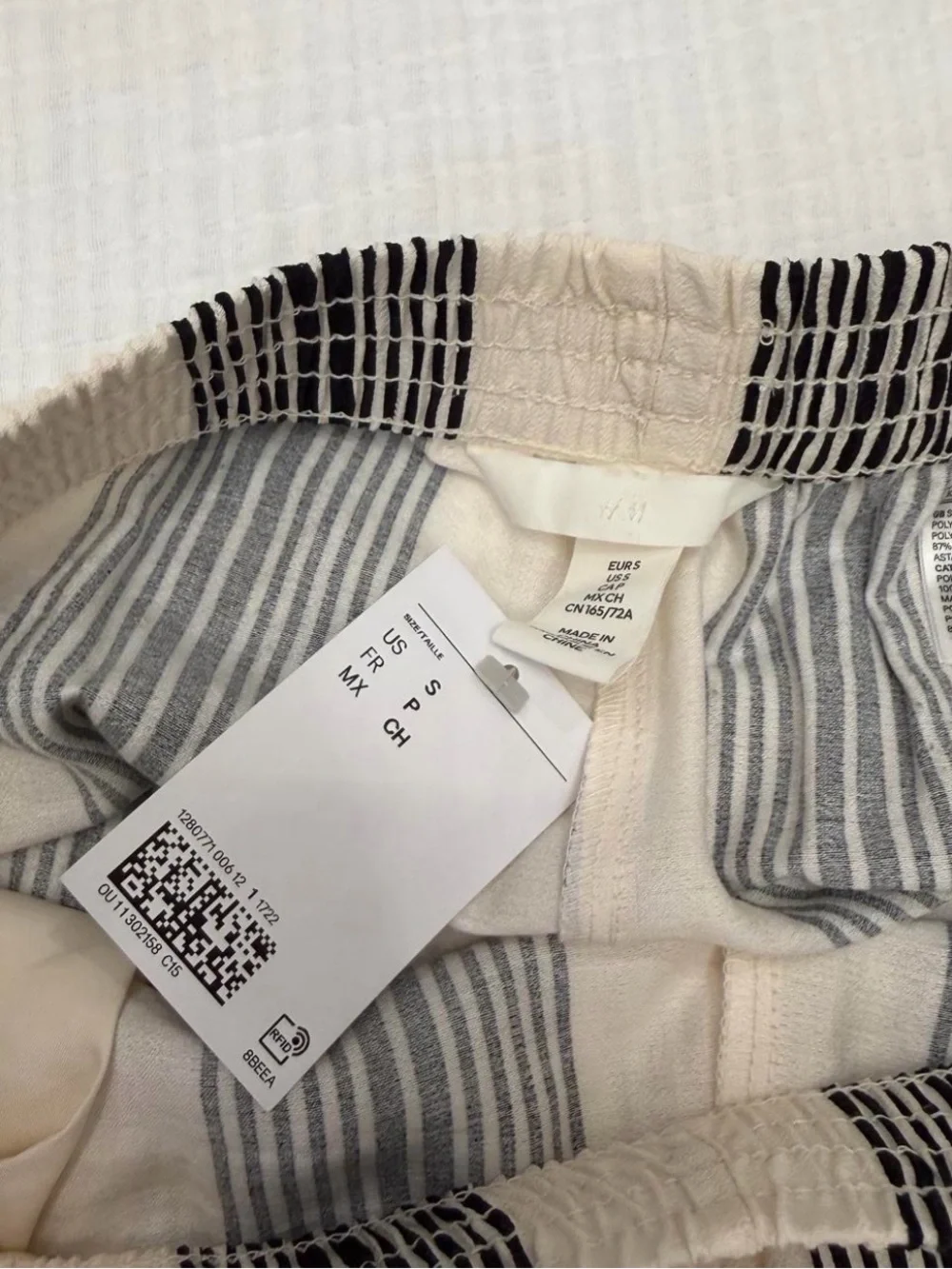 H&M cream black